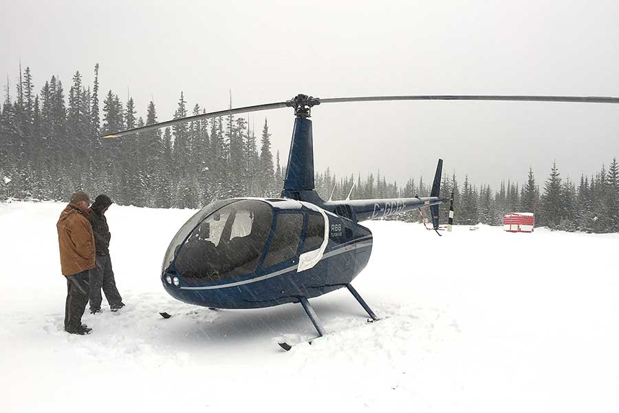 Robinson R66 Turbine helicopter in snow