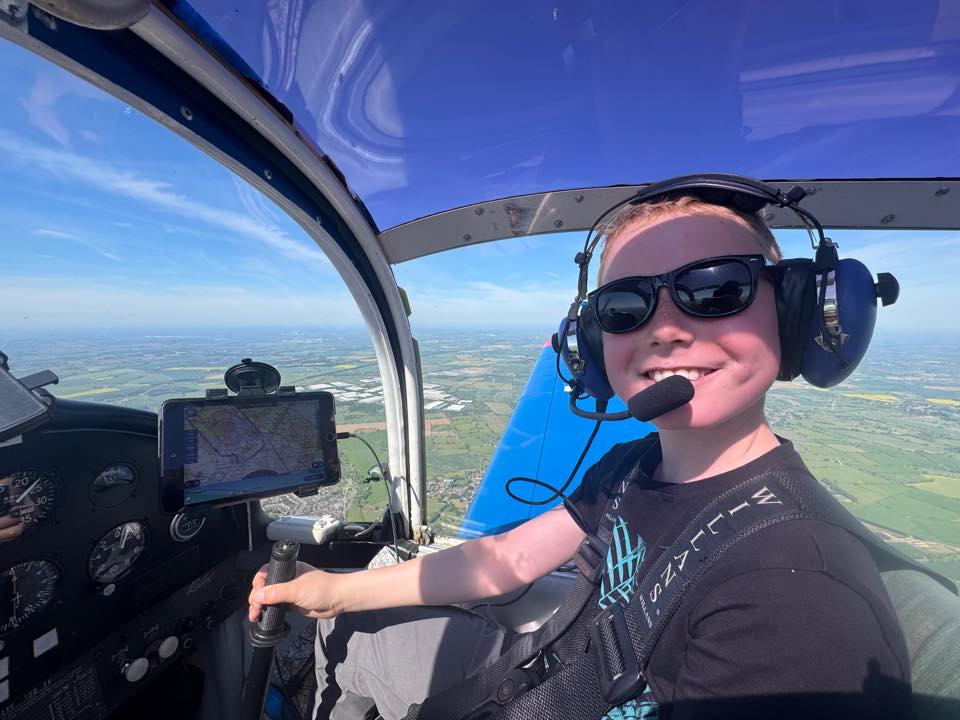 Iain Christie takes his nine-year-old flying for the first time.