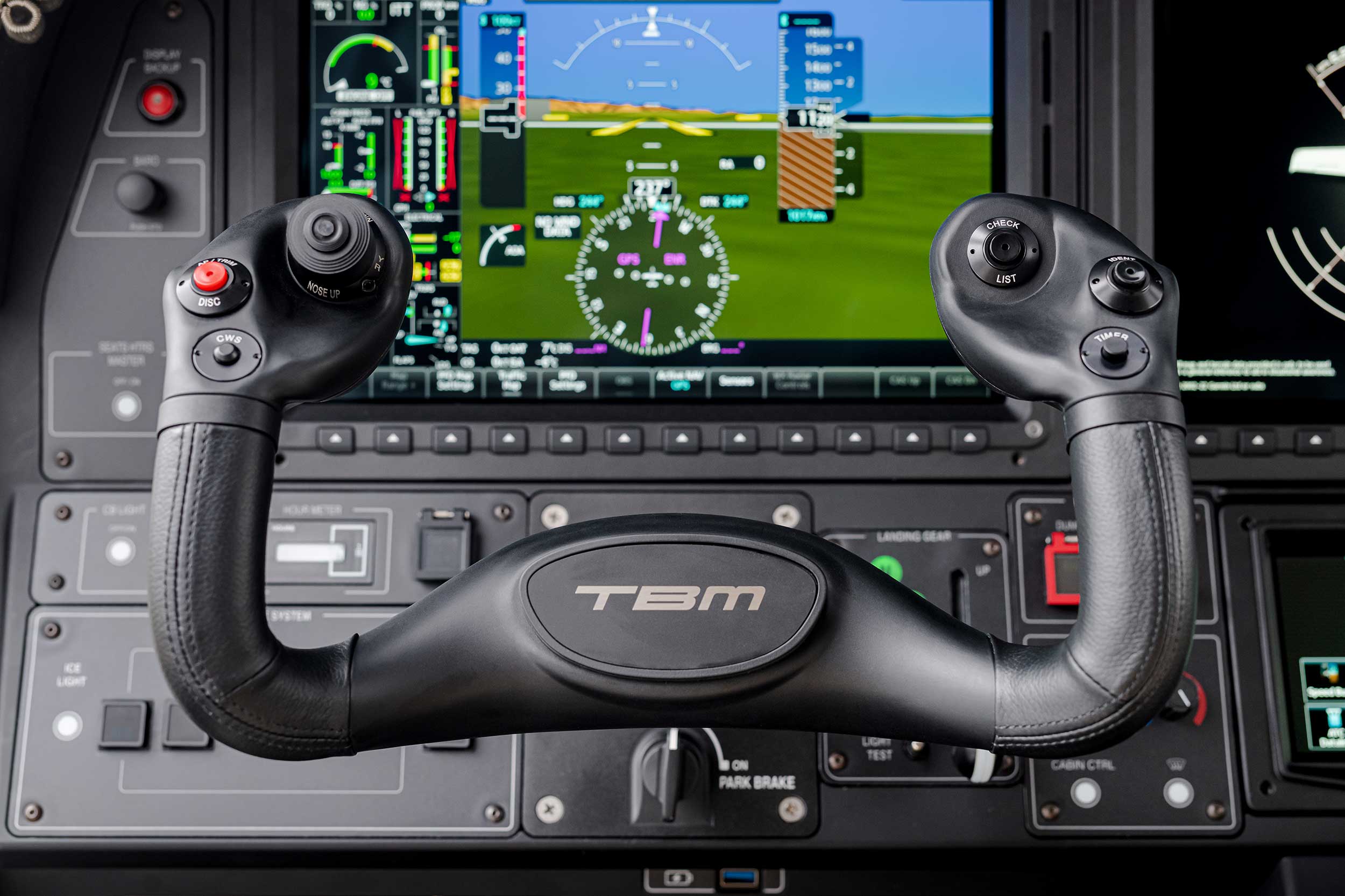 New for the 2023 TBM 960 is a button on the yoke to run through the Garmin flight deck's checklists