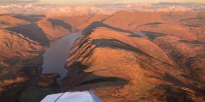 Lewis Alderson over Wastwater at sunset.