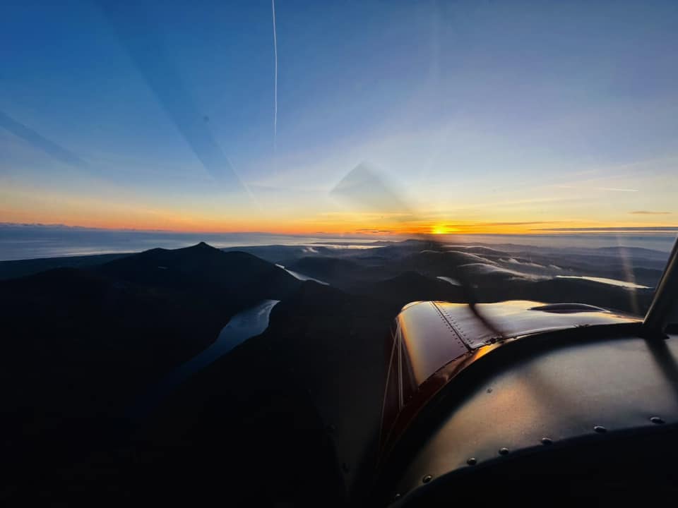 Mark Chambers flying around the Mournes at sunset.