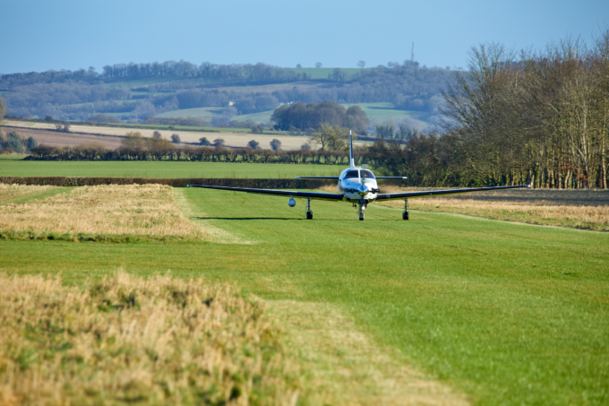 Aircraft on grass runway