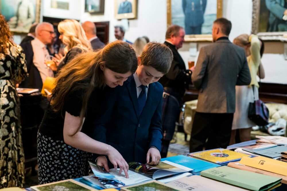 Entries from last year's Dawn to Dusk competition being scrutinised at the prize-giving event last week