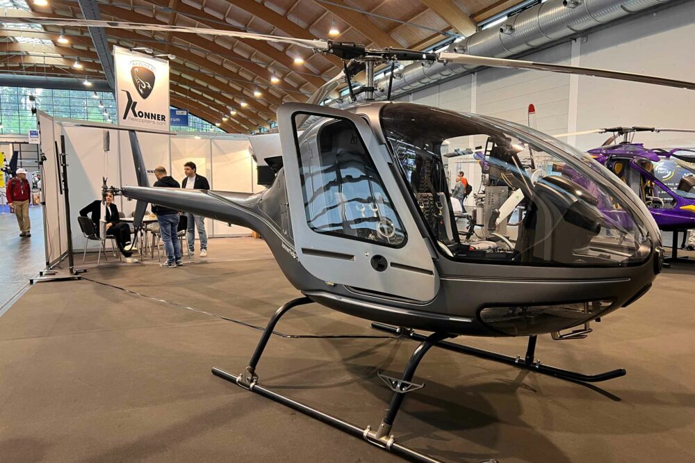 Konner K1-S19 microlight helicopter is fitted with a hybrid power unit: a TK-250 turbine and a 100shp electric motor which engages should the main rotor slow down unexpectedly