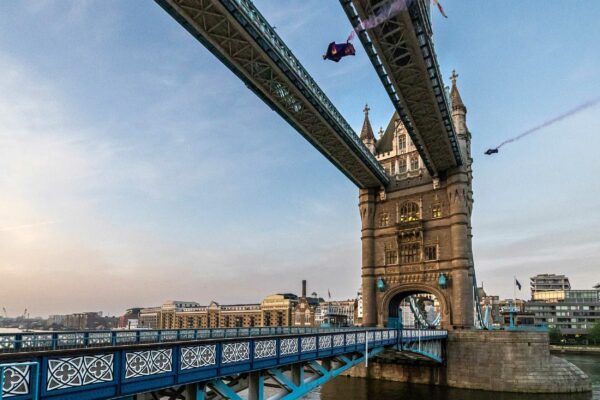 The two wingsuit pilots scorch through London's Tower Bridge