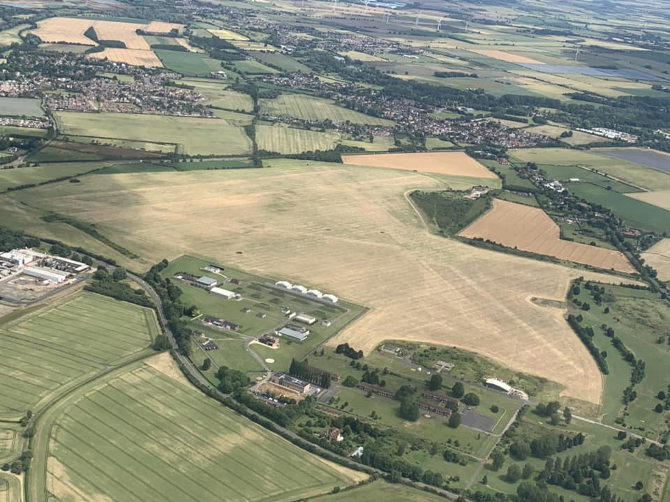 Colin Wilkinson: Former RAF Henlow. The runways are still visible after hay cutting.