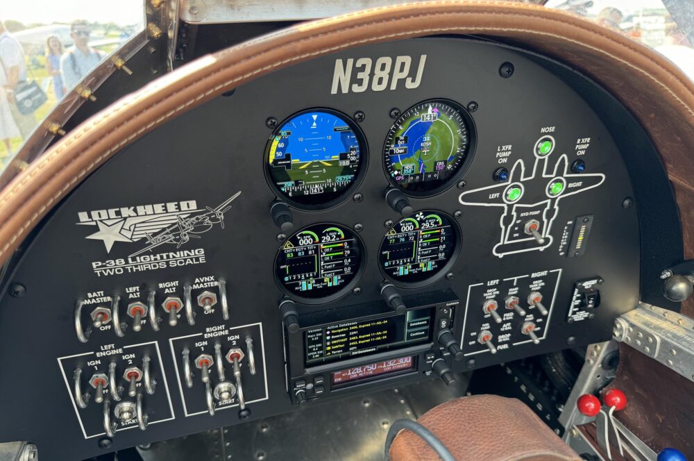 The cockpit of the two thirds scale P-38 features a panel full of Garmin avionics.