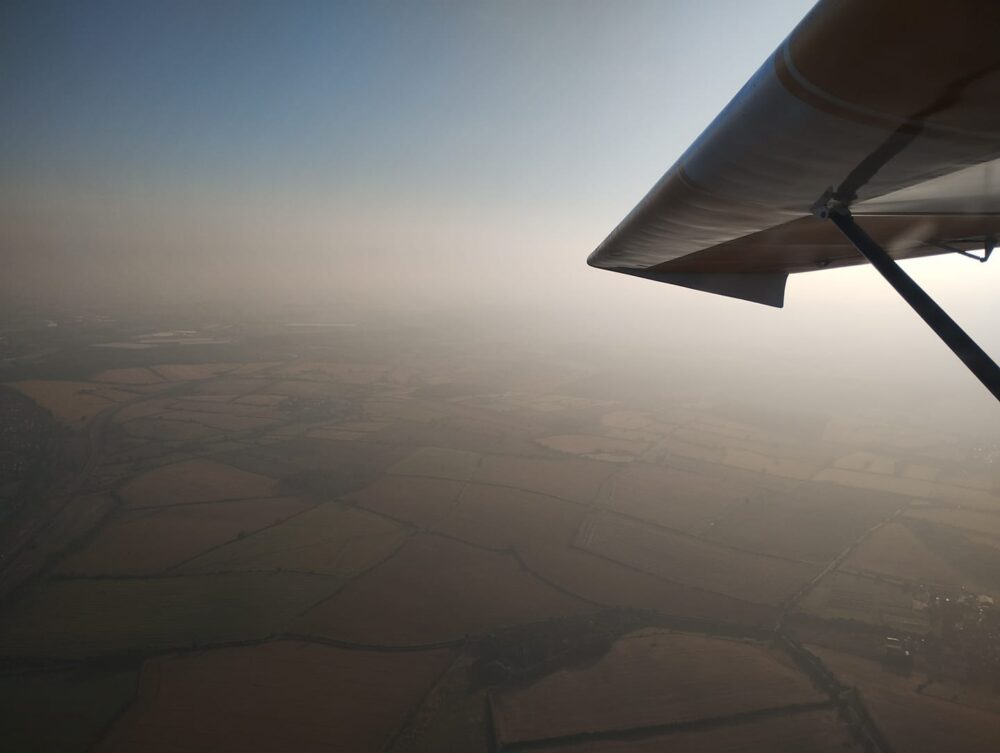 Anthony Crowe flying on a hazy day.