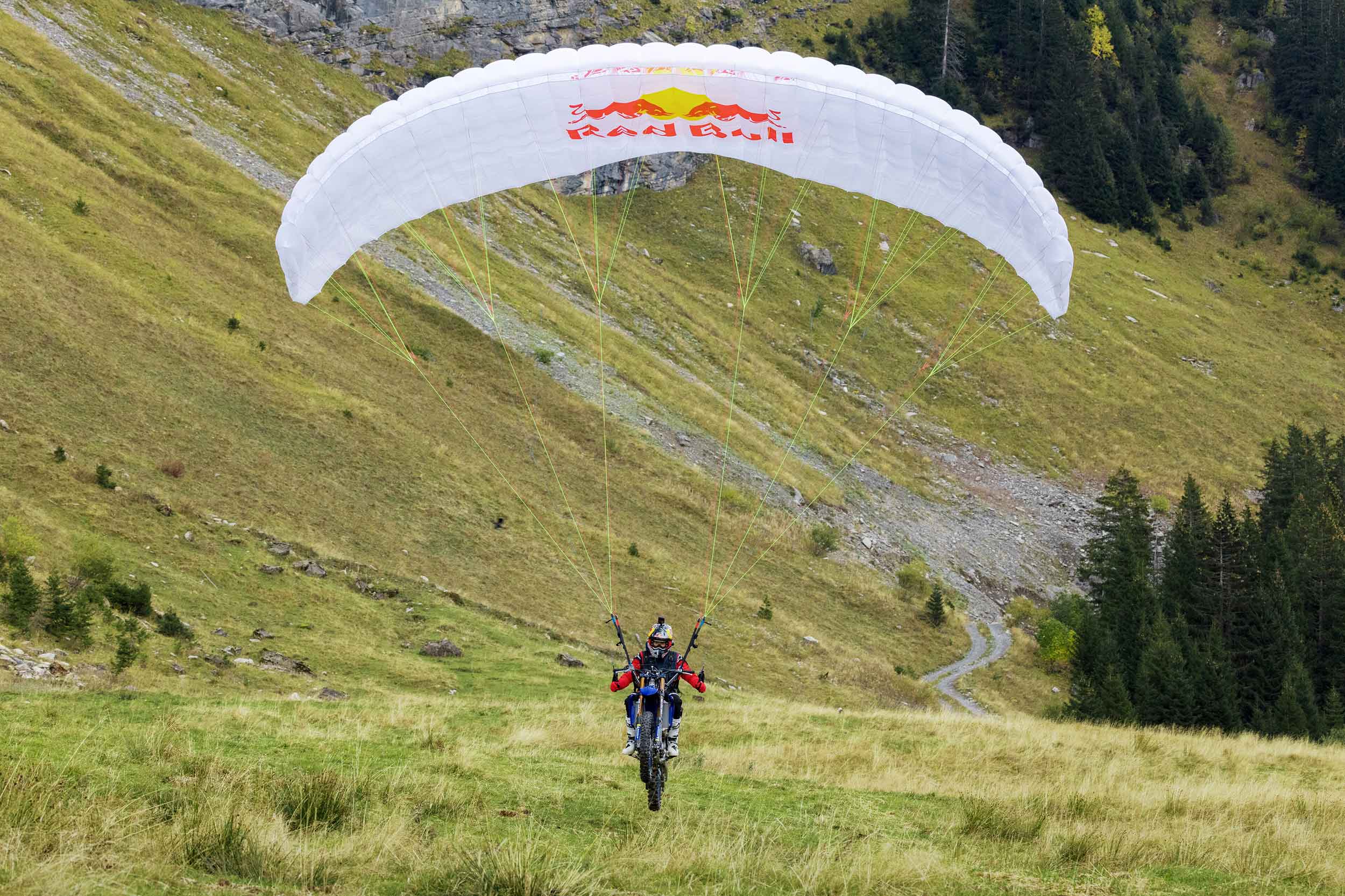 Tom Pages anding the paraglider/motorcycle combination. Photos: Red Bull