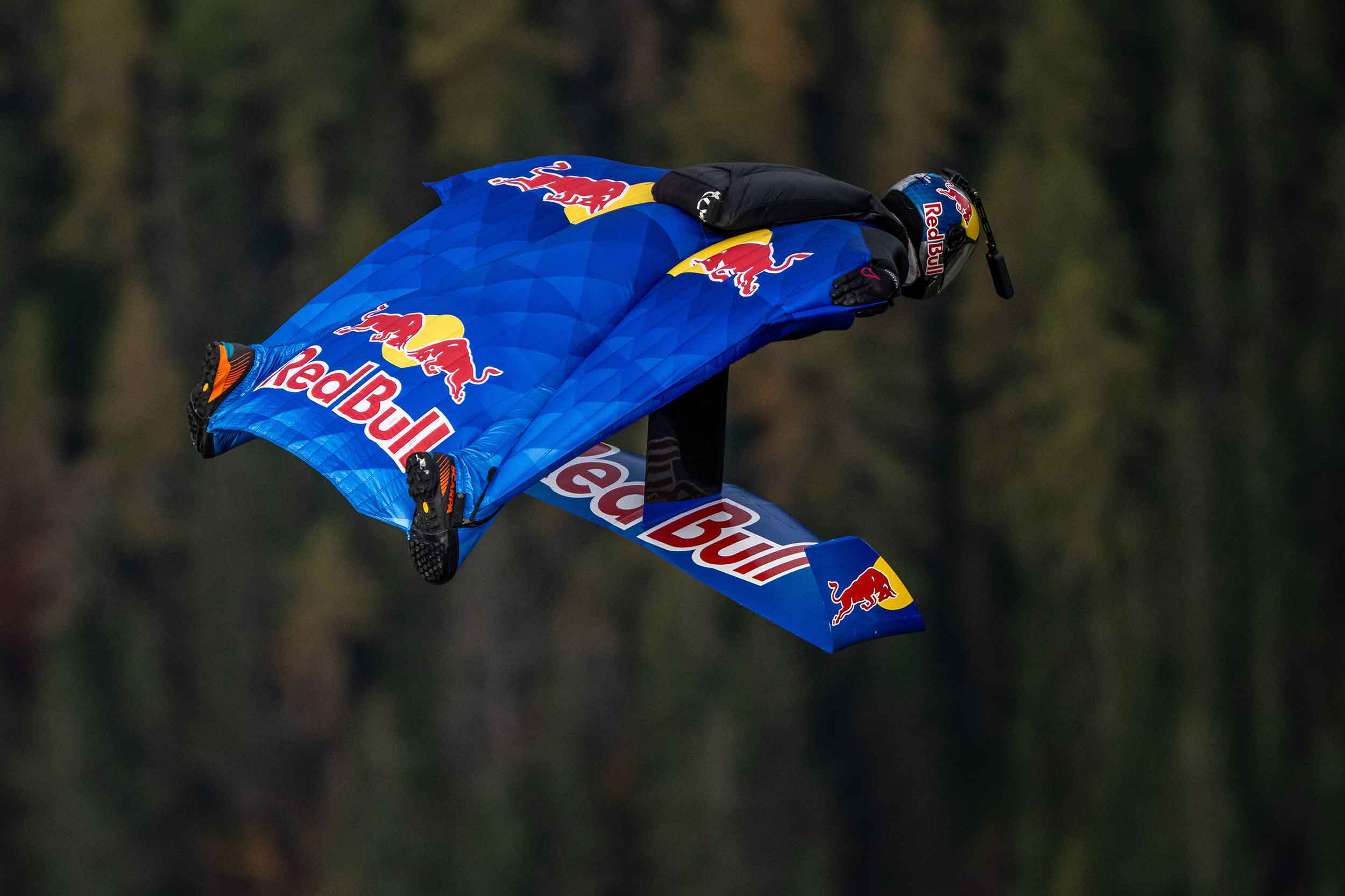 The foil can be clearly seen, adding to the wingsuit's performance. Photos: Red Bull