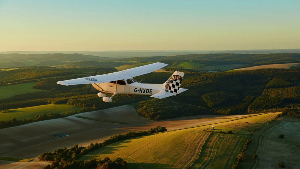 One of Goodwood's Cessnas flying over the Sussex countryside. Photo: Mike Caldwell/Goodwood Flying School