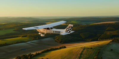 One of Goodwood's Cessnas flying over the Sussex countryside. Photo: Mike Caldwell/Goodwood Flying School