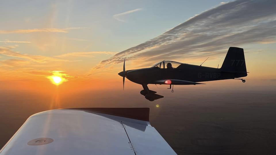 Flying formation at sunset.