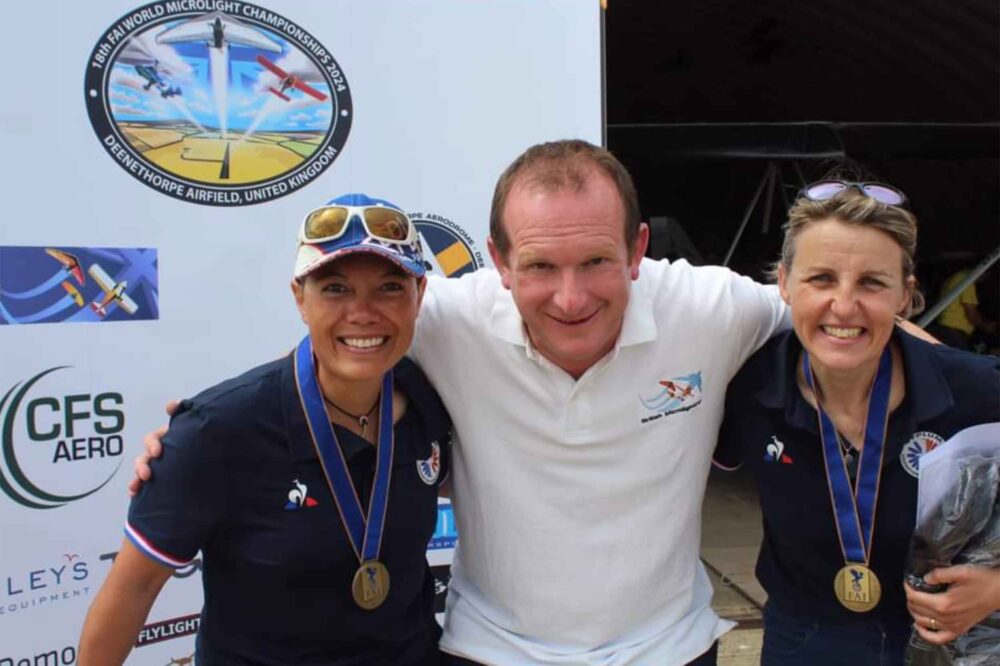 'Owain is a fantastic people person' - here he is at the 2024 World Microlight Championships with French pilots Patricia Be and Emilie Paperin. Photo: BMAA