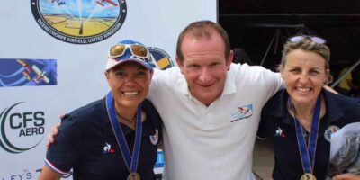 'Owain is a fantastic people person' - here he is at the 2024 World Microlight Championships with French pilots Patricia Be and Emilie Paperin. Photo: BMAA