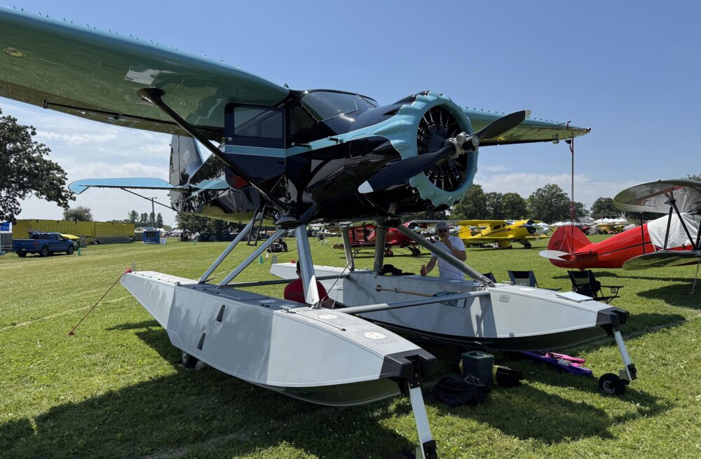 Fabulous restoration of a Stinson SR-9C by Rare Aircraft was a monster on it's custom amphibious float installation.