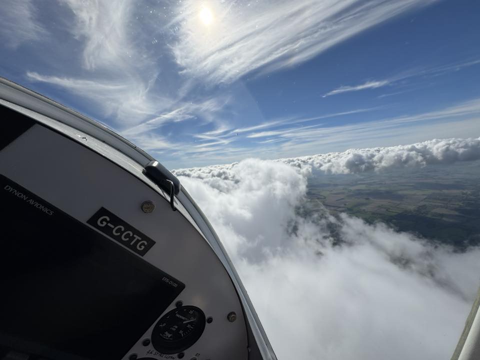 Flying among clouds