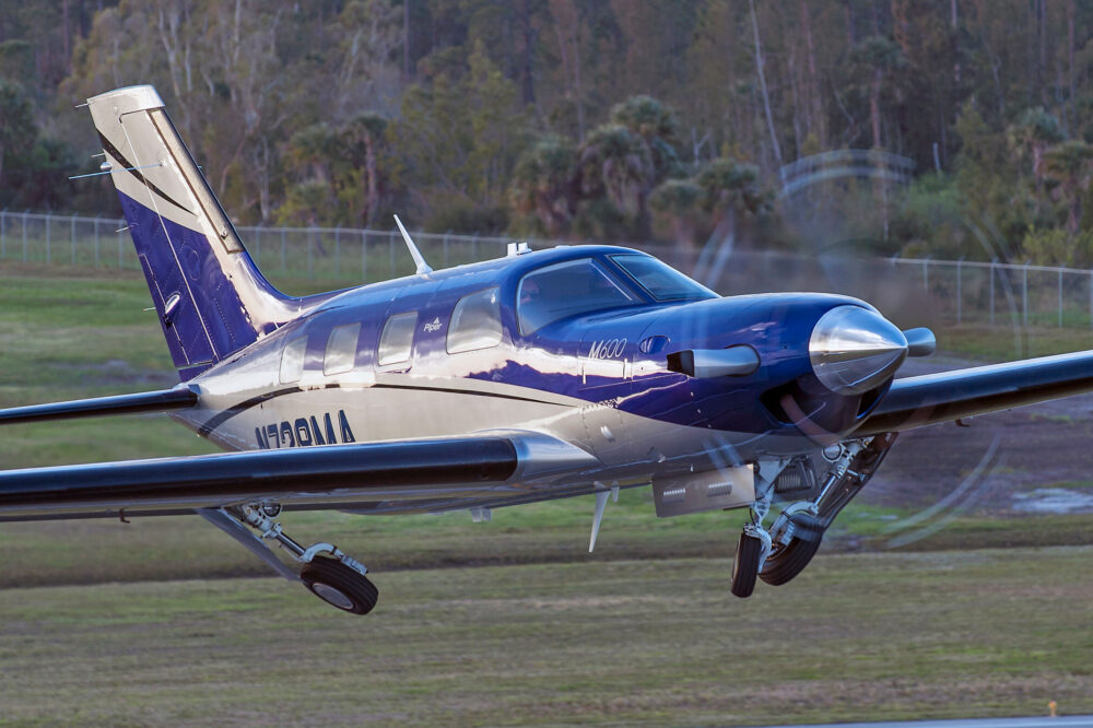aircraft taking off, retracting wheels