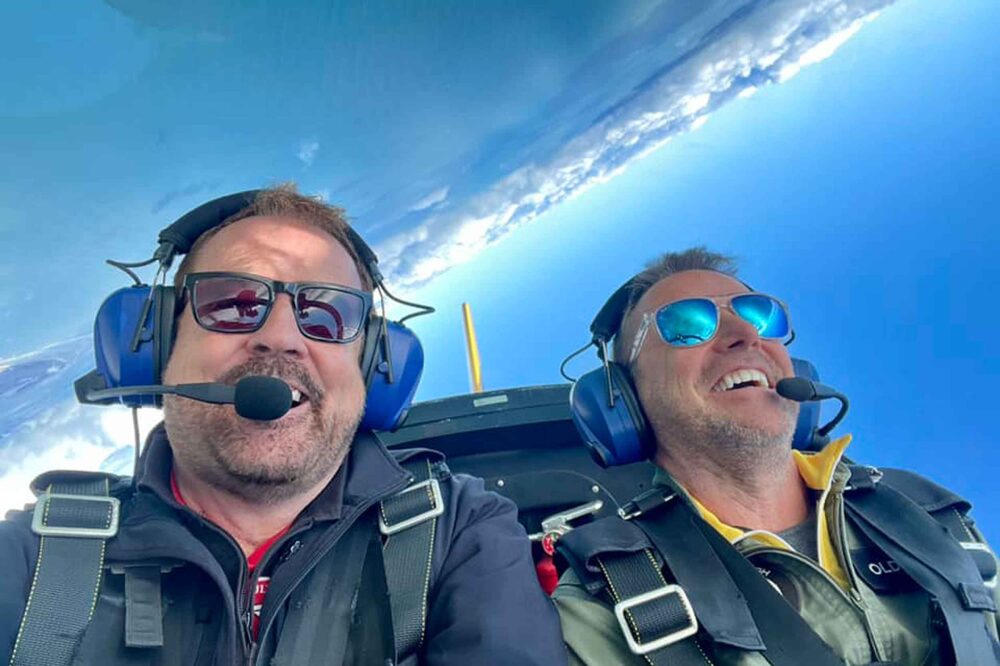 Mark Greenfield, left, making sure his clients enjoy Ultimate High's training courses!