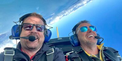 Mark Greenfield, left, making sure his clients enjoy Ultimate High's training courses!
