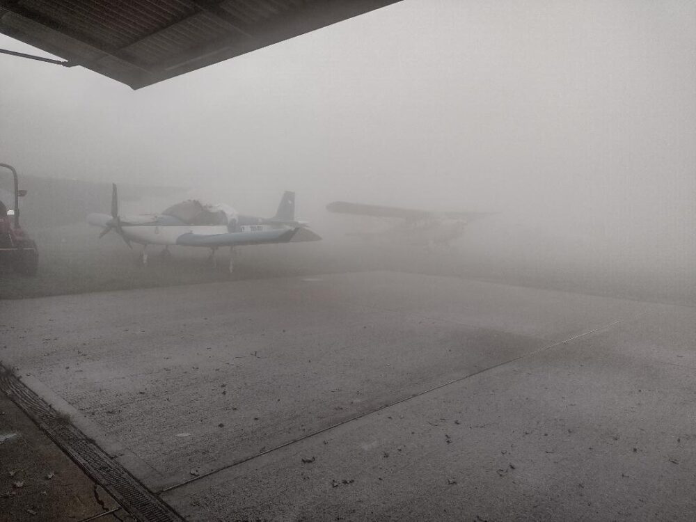 Light aircraft in fog