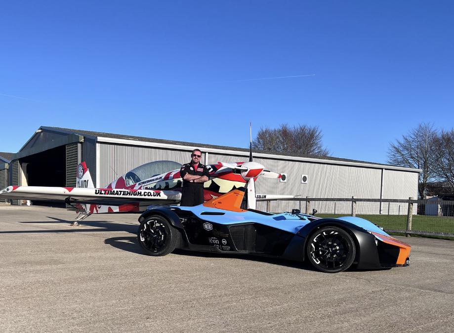 Car and aeroplane on the ground
