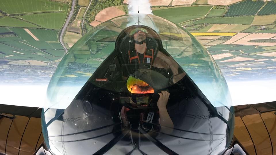 Pilot flying aerobatics