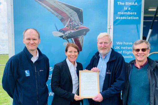 Geoff Weighell with Rachel Gardner-Poole, Head of the CAA’s General Aviation Unit in 2019, when the BMAA won the ability to issue pilot licences. Photo: BMAA