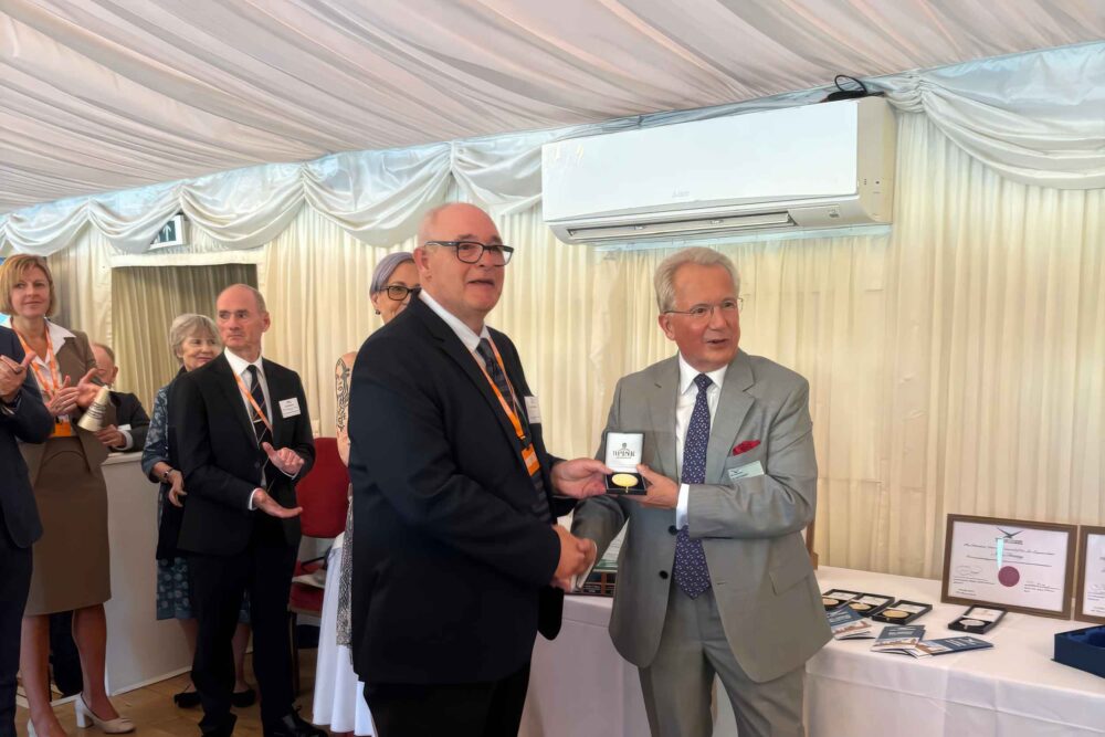 FLYER's Ian Seager receiving the award from the Air League
